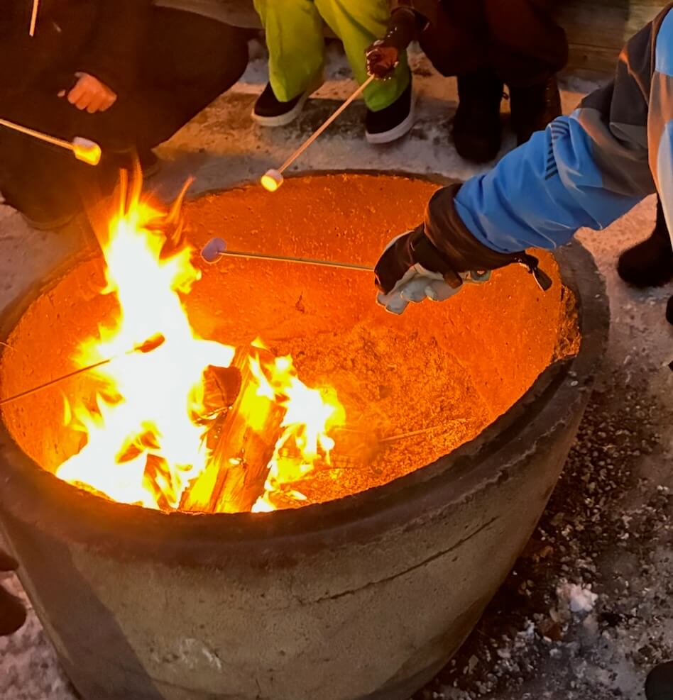 Toasting marshmallows over a campfire in Levi
