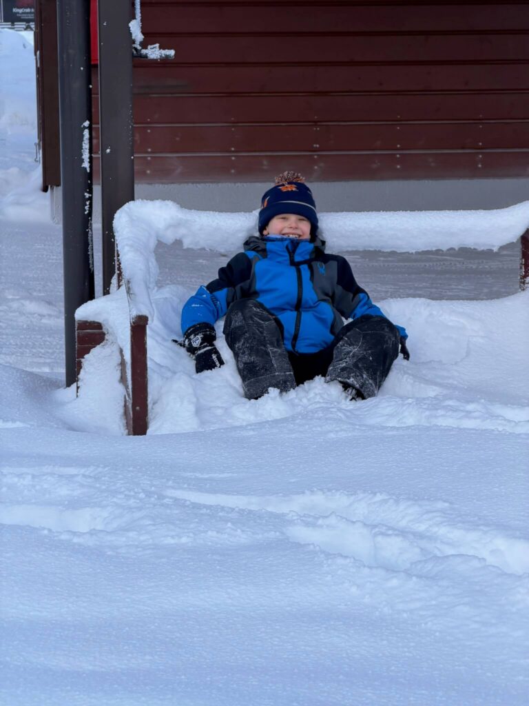 Snowy bench at Levi golf course.