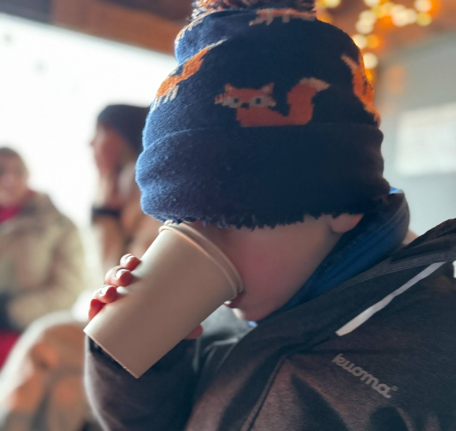 Child enjoying a drink at Levi’s Secret Café