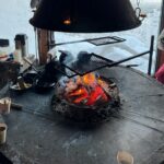Fireplace and hot drinks at Levi’s Secret Café