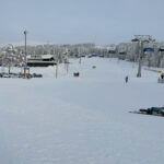 Early morning view of wide ski slope and chairlift at Levi’s South Slopes